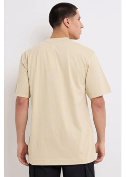 Béžové pánske tričko značky Calvin Klein
