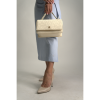 Crossbody kabelka Tommy Hilfiger v smotanovej farbe Crossbody kabelka Tommy Hilfiger v smotanovej farbe