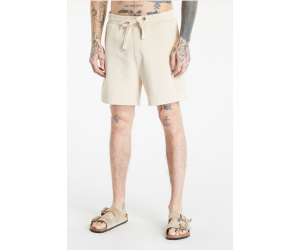 Teplákové béžové kraťasy Tommy Jeans