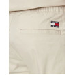 Pánske krémové elastické nohavice Tommy Jeans Pánske krémové elastické nohavice Tommy Jeans