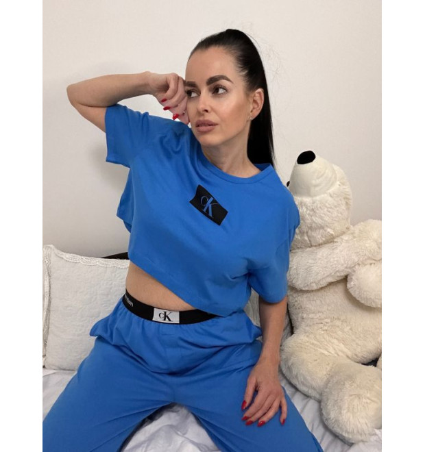 Modré dámske tričko Calvin Klein krátkeho strihu Modré dámske tričko Calvin Klein krátkeho strihu