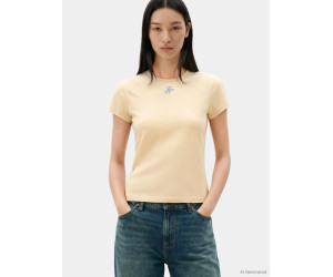 Tommy Hilfiger Slim tričko s textúrovaným logom béžové Tommy Hilfiger Slim tričko s textúrovaným logom béžové